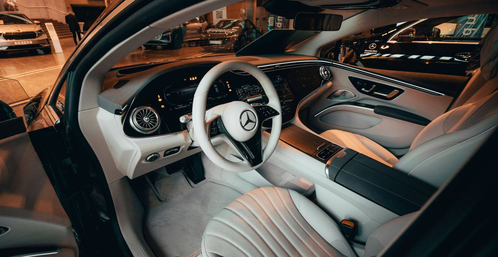 Luxurious Mercedes-Benz interior with elegant leather seats and advanced dashboard.